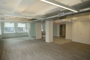 550 Fifth Avenue Office Space - Bullpen with Glass Office in the Background