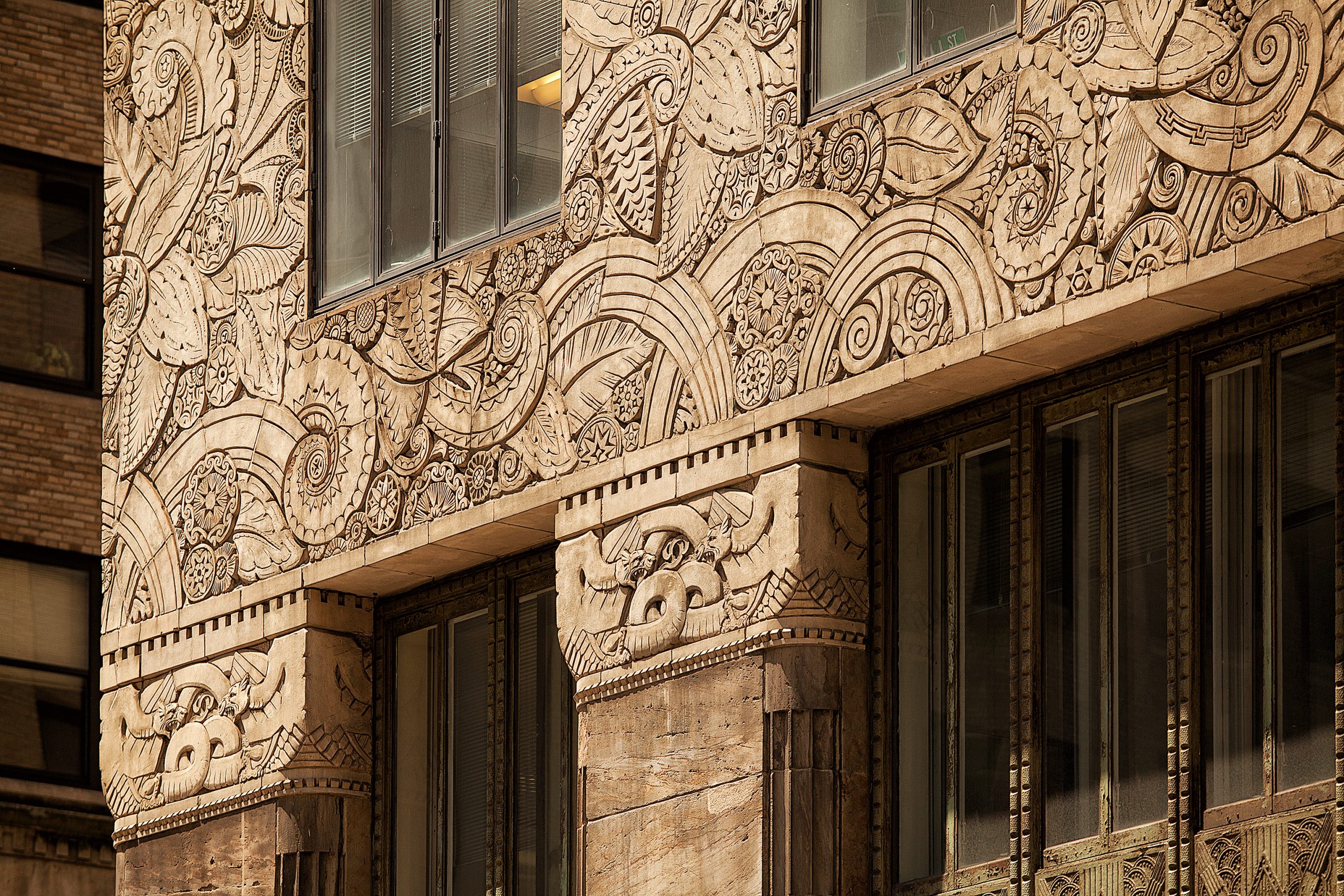 Close-up of Art Deco detail, Chanin Building NYC, symbolizing luxury and architectural finesse.