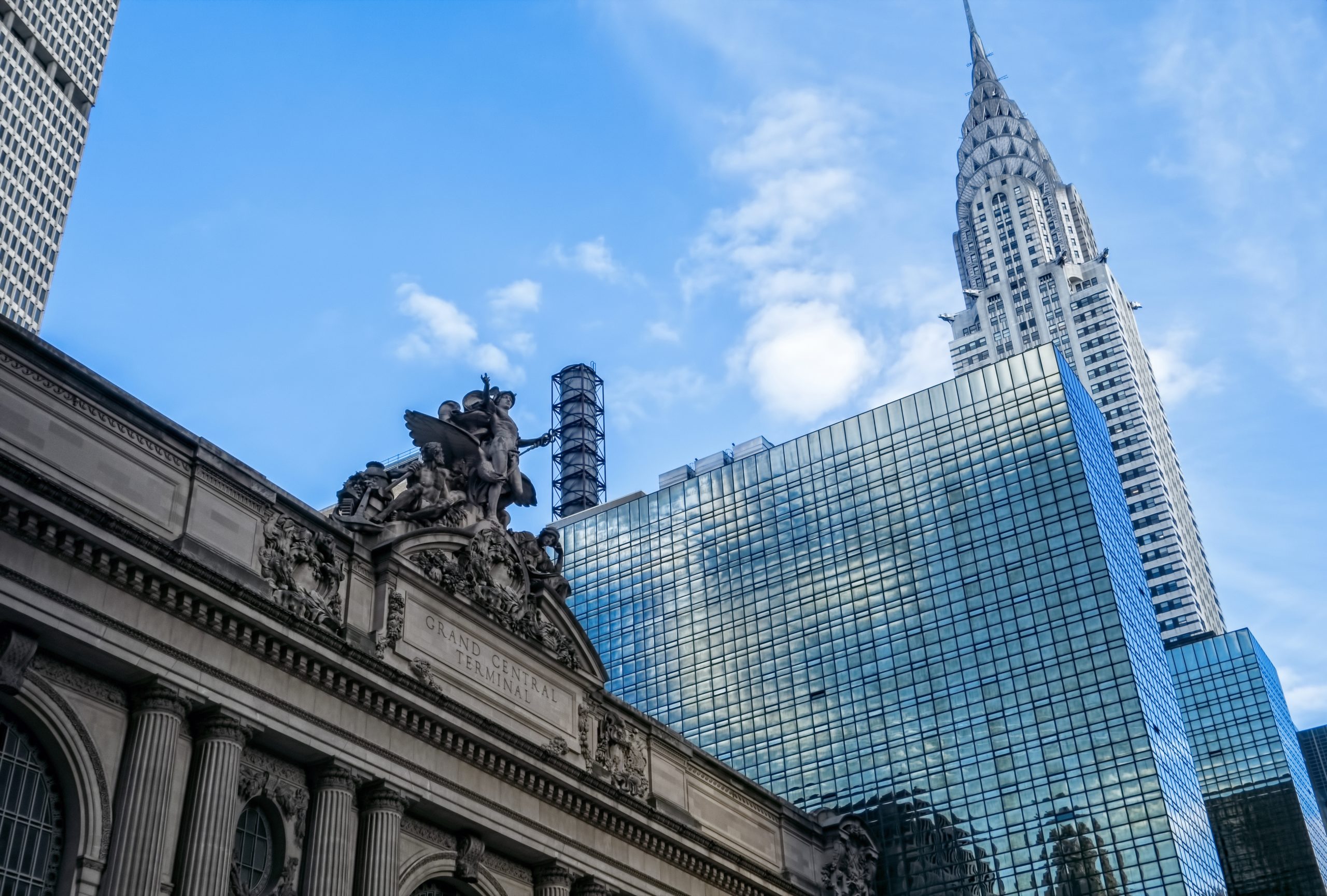 Grand Central Terminal’s facade with the Grand Hyatt and the Chrysler Building in the background.