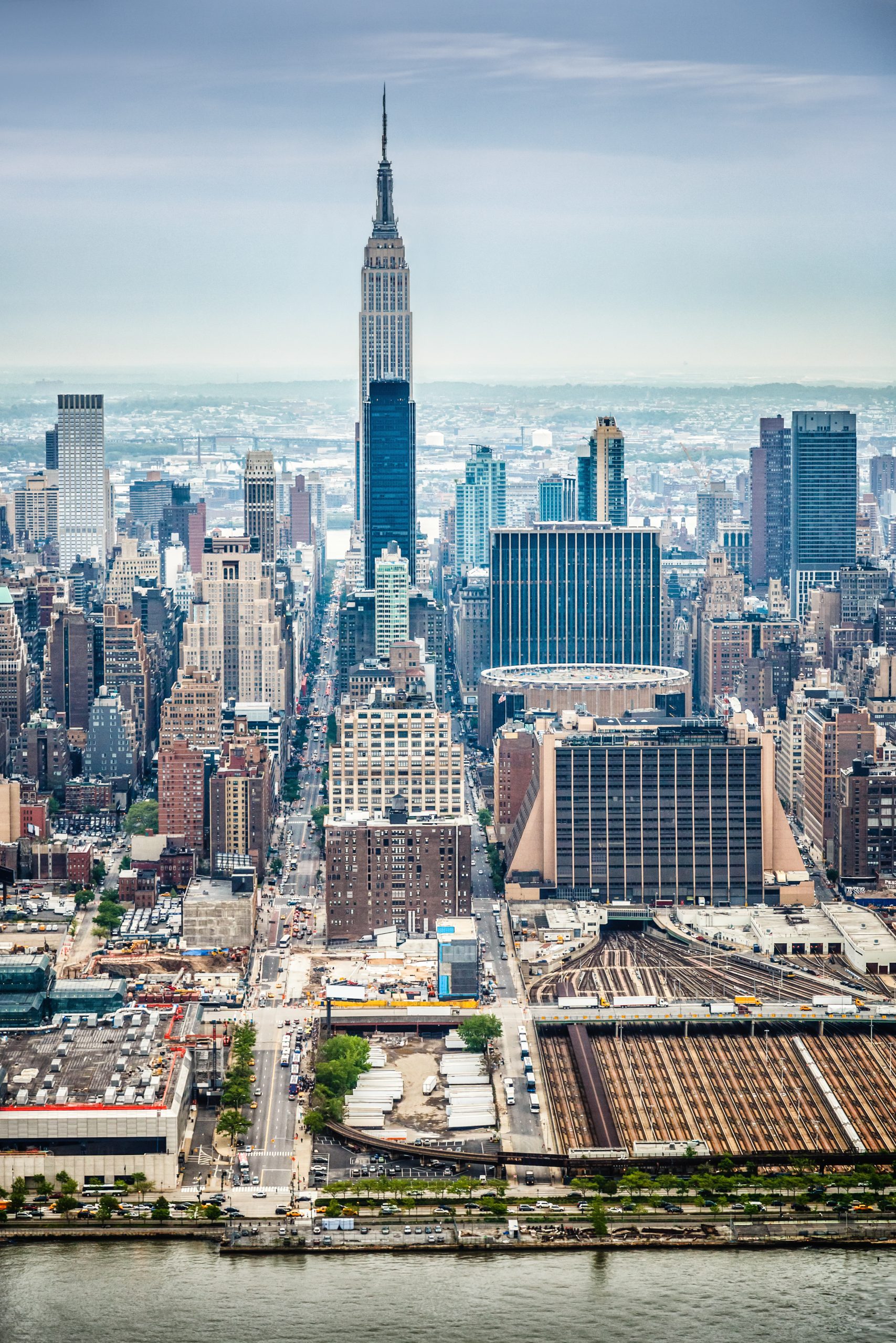 Aerial view Manhattan, with 15 Penn Plaza on the right, showcasing NYC's architectural ambition.