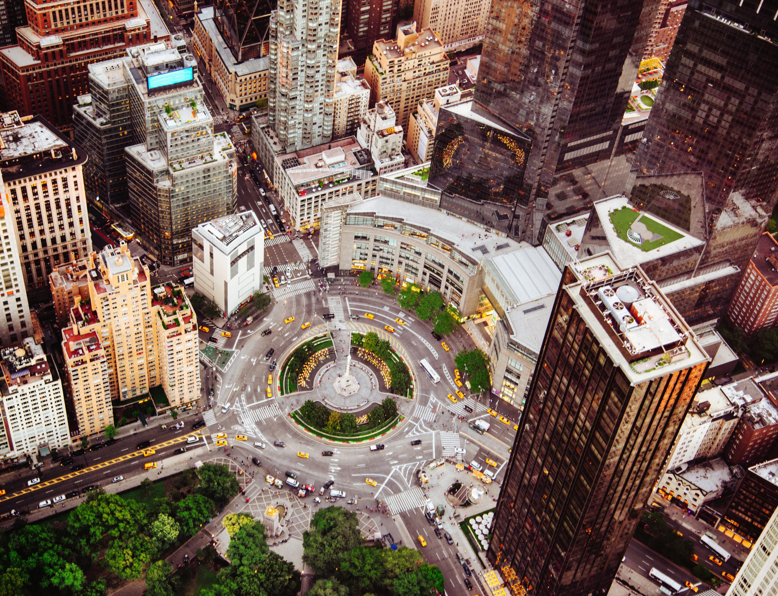 Aerial view of Columbus Circle roundabout in Manhattan, NYC with taxis.
