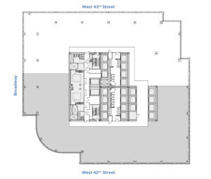 Architectural floor plan depicting a building layout. The plan includes labeled surrounding streets: Broadway, West 42nd Street, and West 43rd Street. Interior features include multiple rooms and corridors, with detailed notations of structural and utility placements, akin to NYC office buildings with outdoor space.