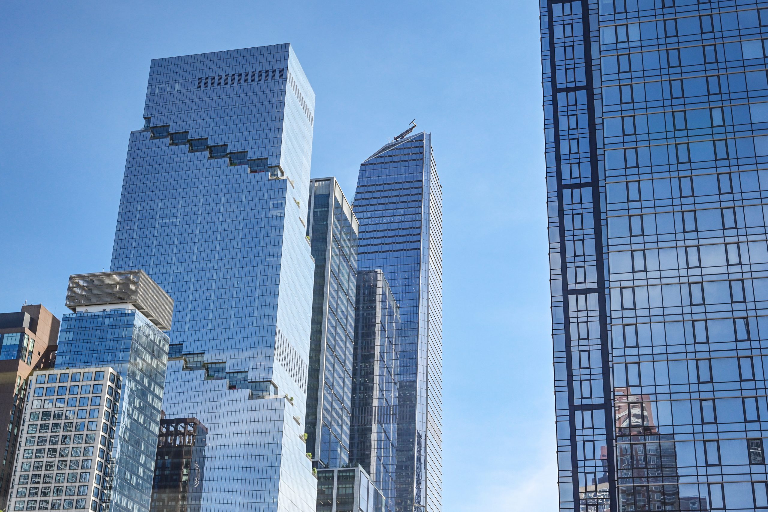 New York City Skyscrapers with a view of the Iconic The Spiral Building at 66 Hudson Boulevard