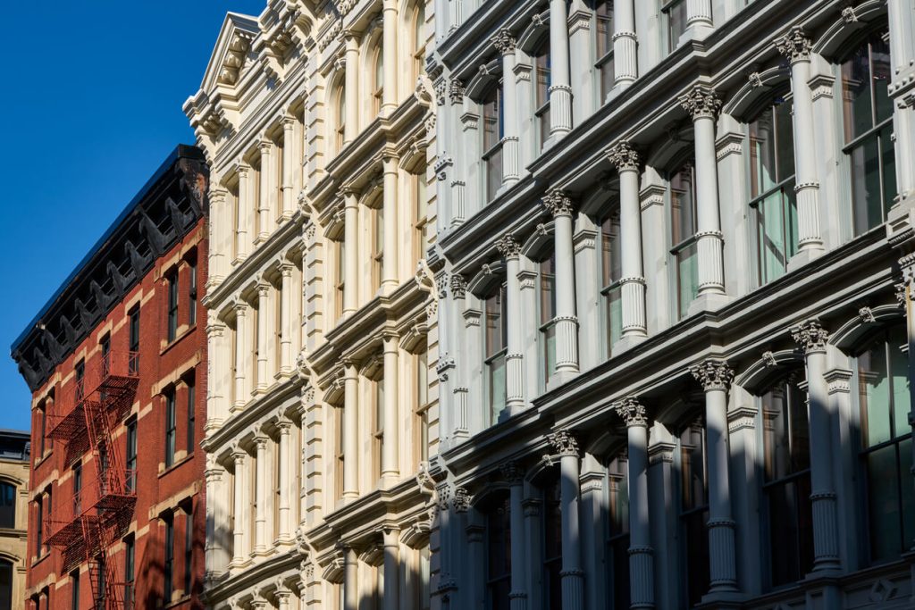 Exterior photo of Cast Iron style commercial buildings in SoHo, New York City.