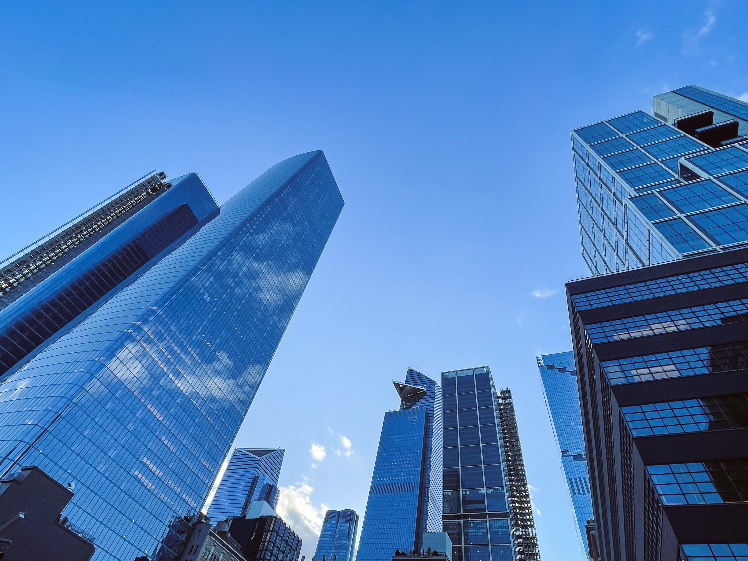 A close-up of Manhattan skyscrapers, including the Hudson Yards development.