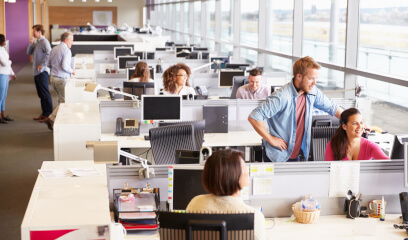Colleagues collaborate in NYC tech bullpen space